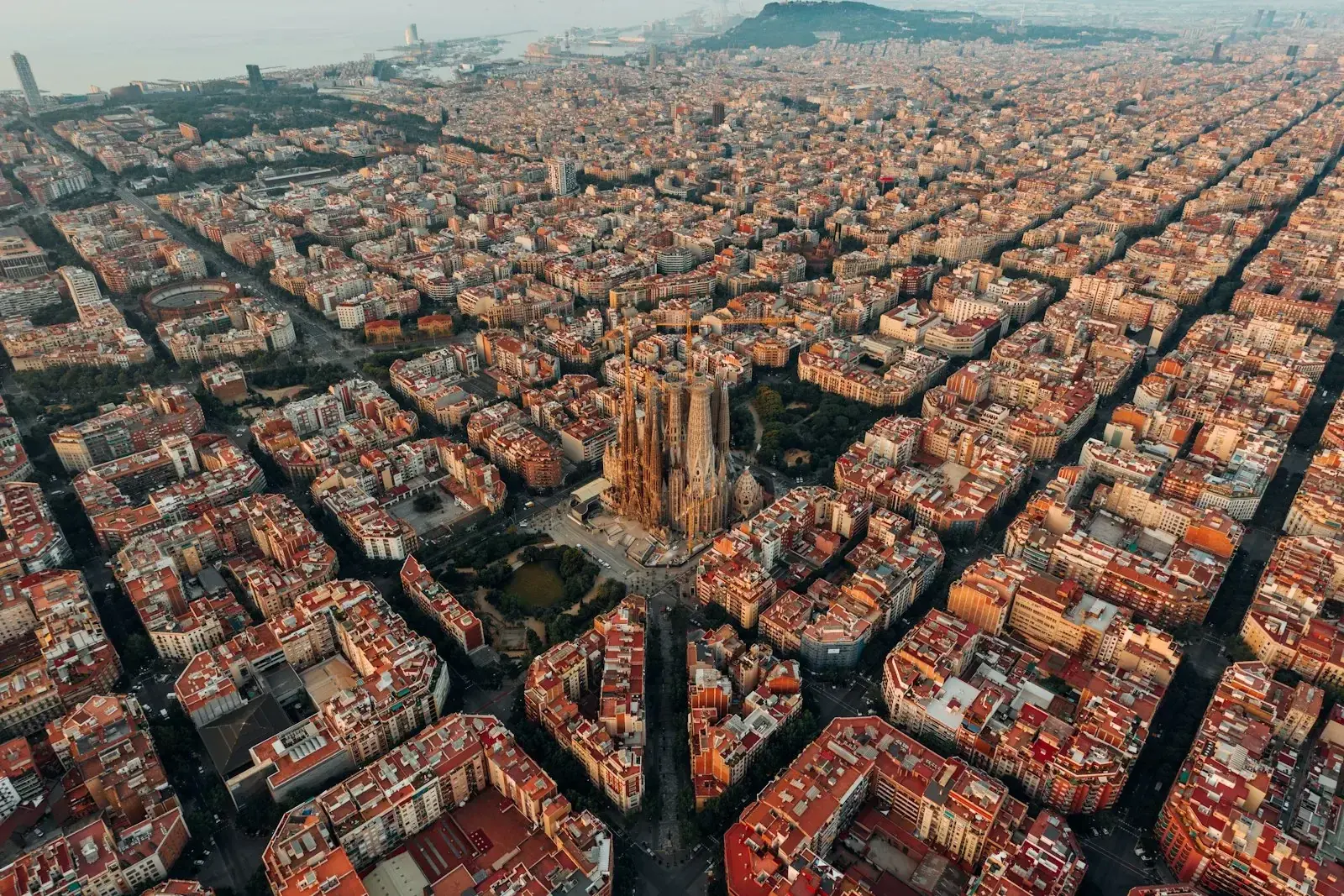 Barcelona skyline at dusk, representing Spain's Beckham Law 24% flat expat tax regime in 2026