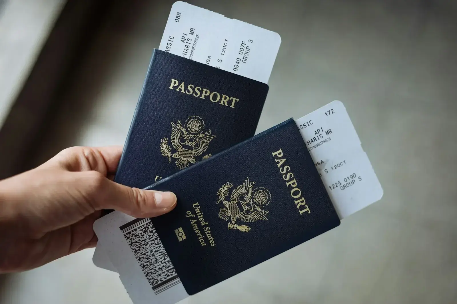 Person reviewing social media profiles on a smartphone representing US visa online presence vetting