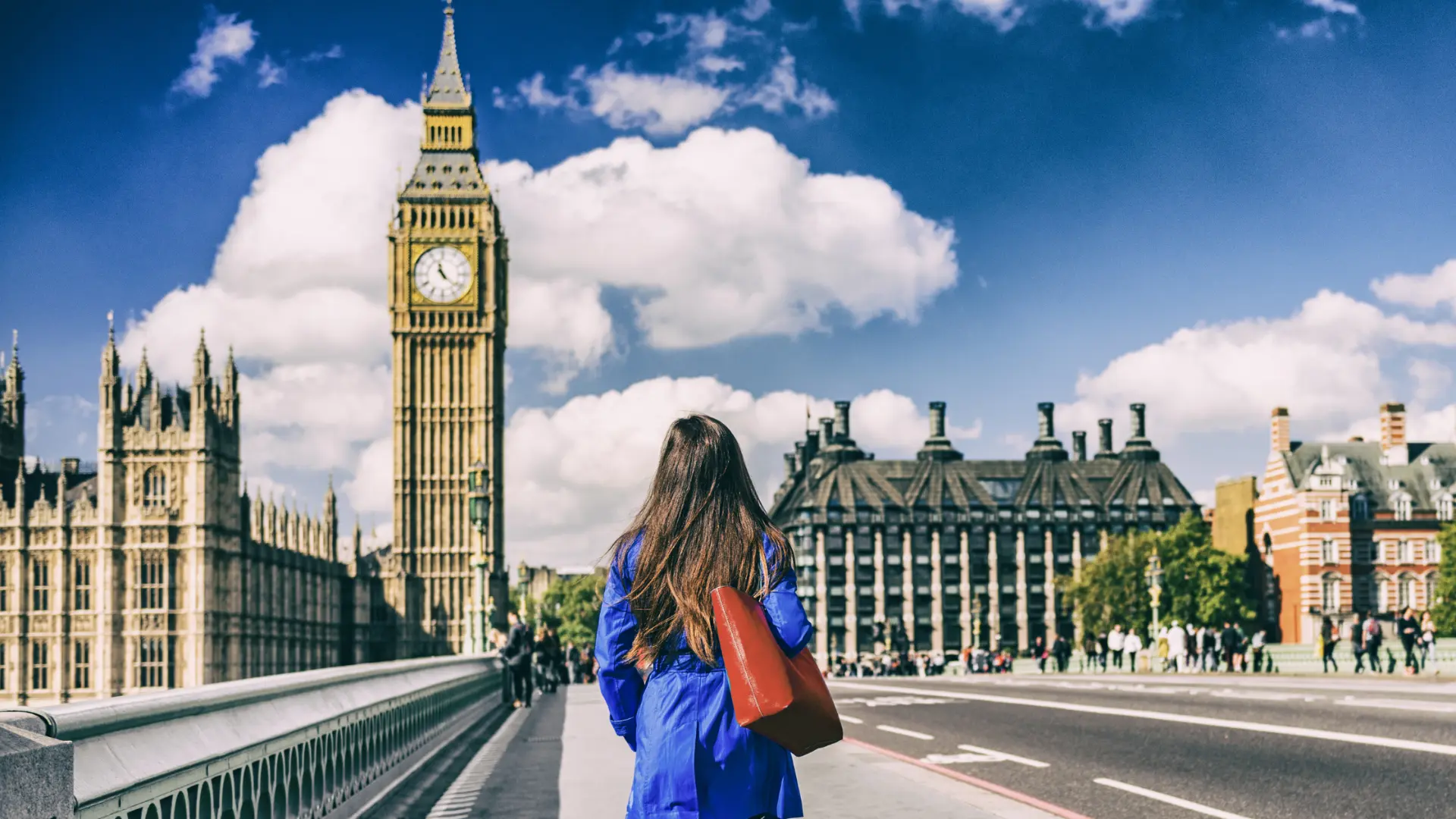 Professional woman in London with Big Ben and Parliament in the background — global mobility management services by xpath.global
