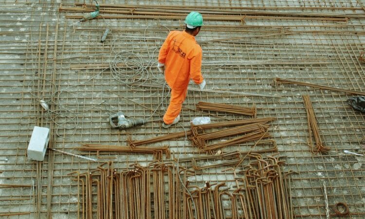 man walking on construction site