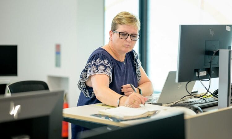 a person sitting at a desk