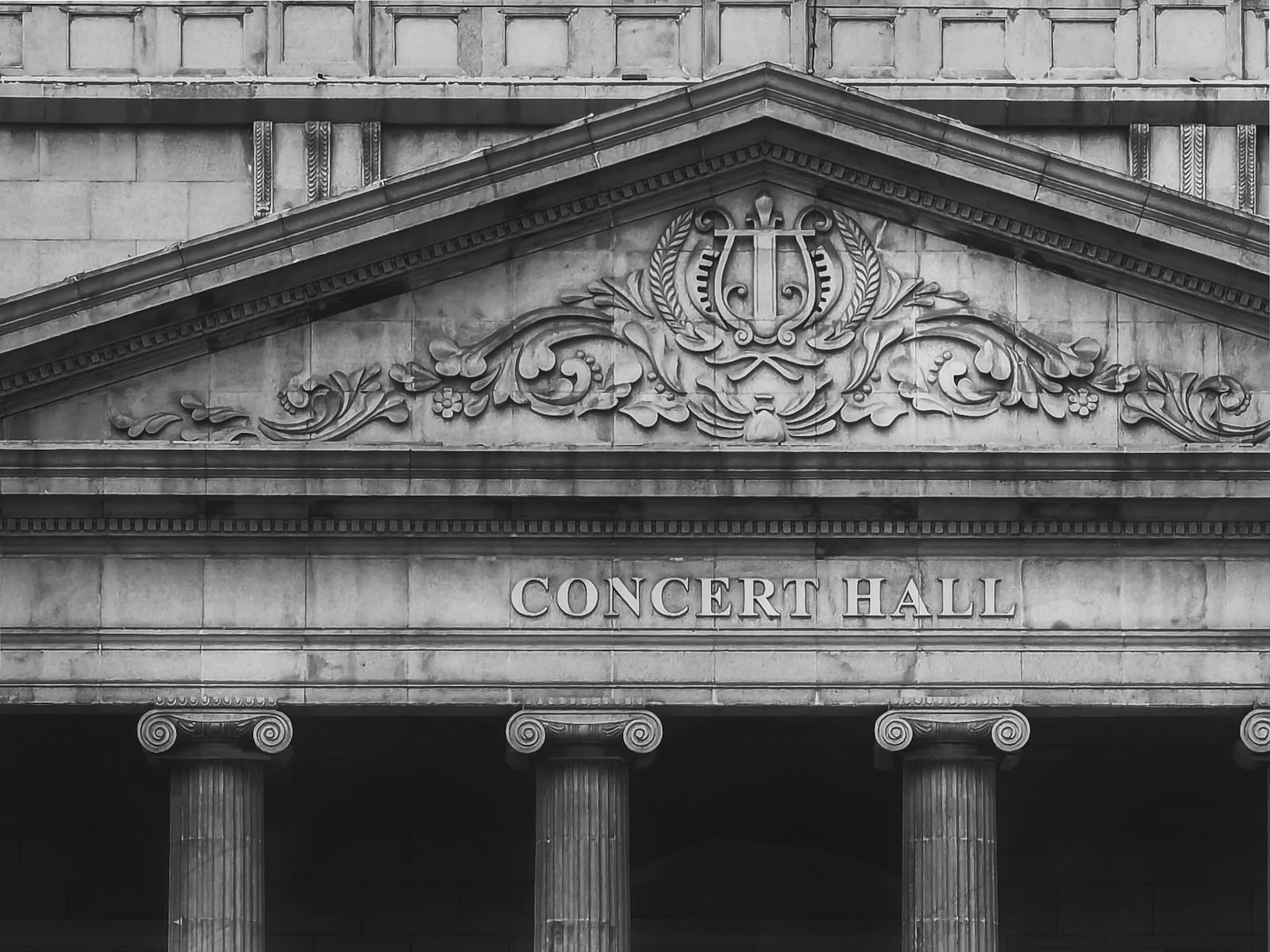 grayscale photo of concrete building